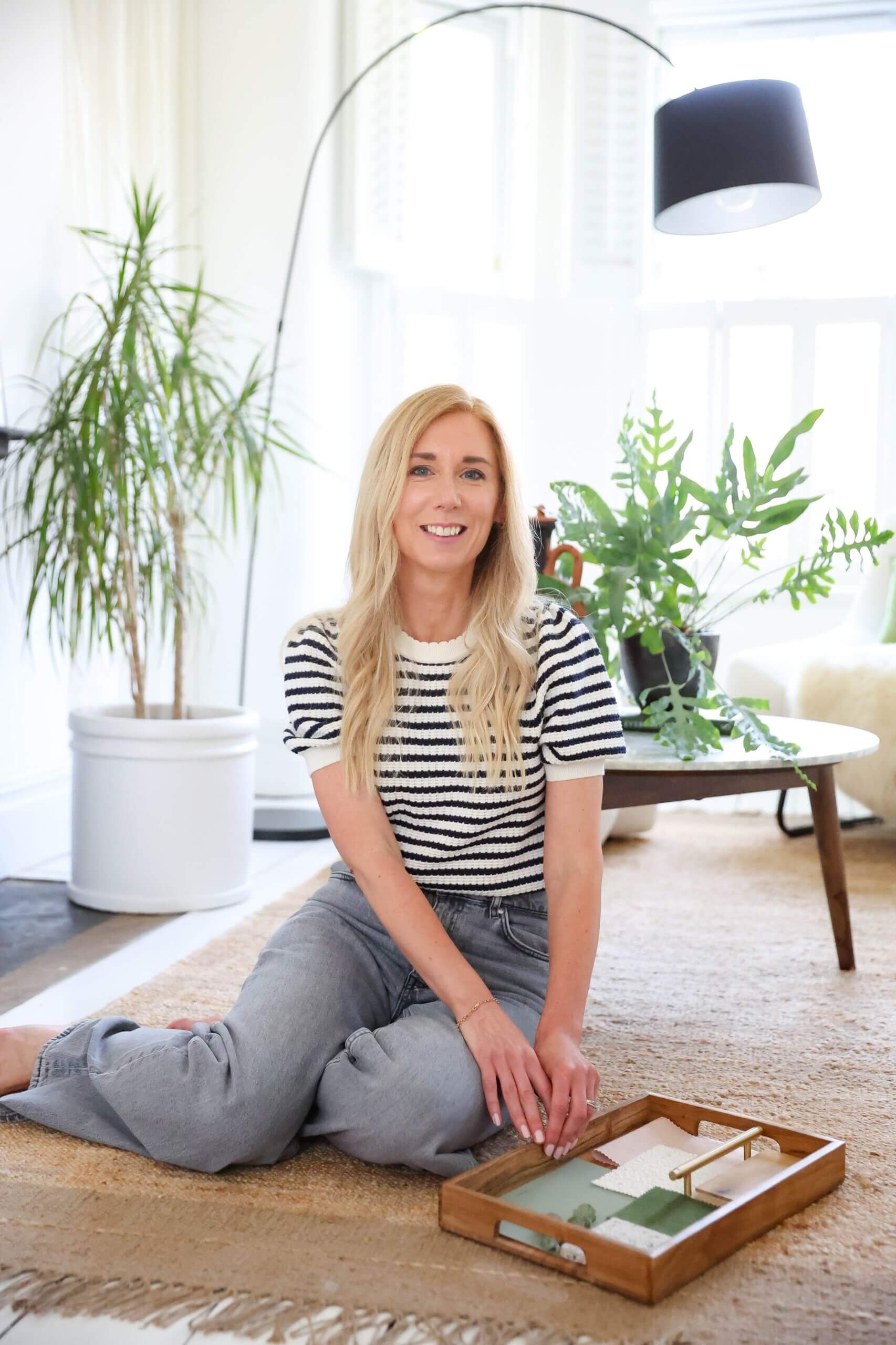 Kelly Moorcroft - Founder and Interior Designer - Spaces by Kelly Interior Design. Behind the scenes with Kelly at work on a client mood board