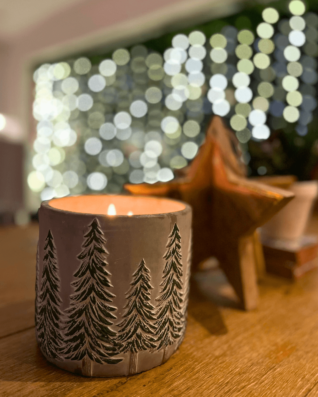 Calm Christmas candle on dining table